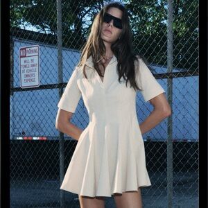 Zara Chic Cream Mini Dress with Black Boots